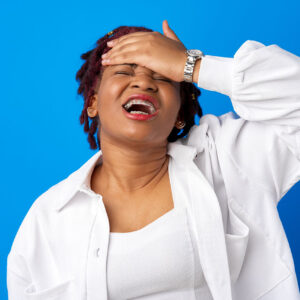 frustrated black woman with hand on forhead